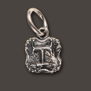 Waxing Poetic  Crest Insignia Sterling Charm